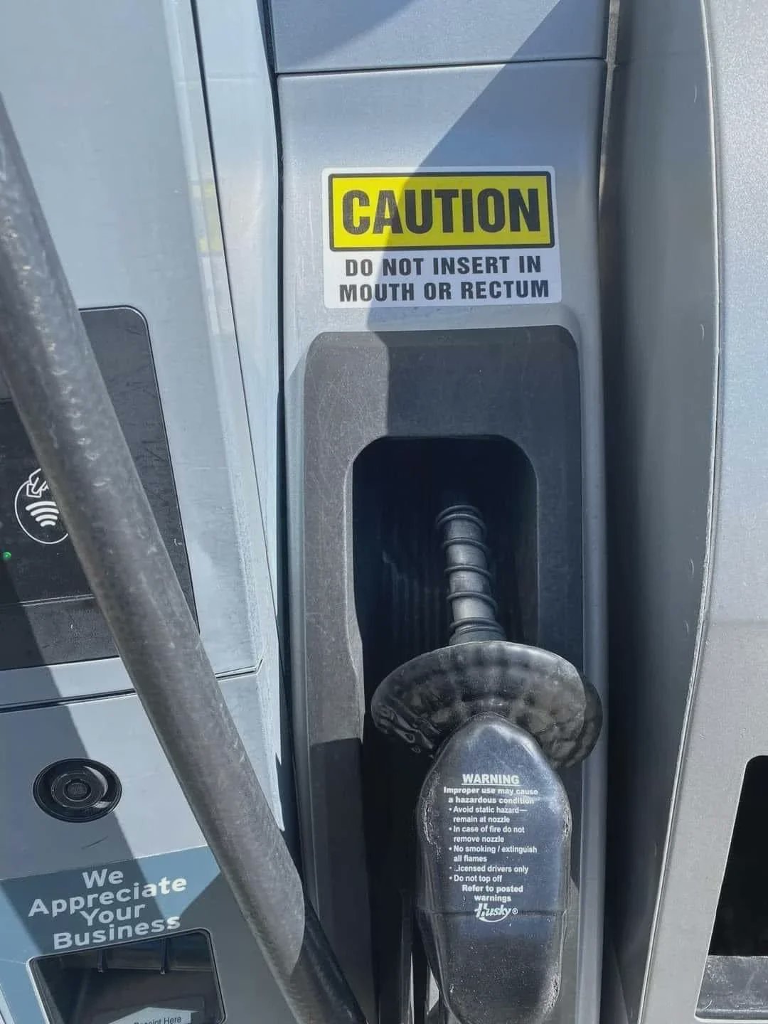 Caution sign gas station.jpg