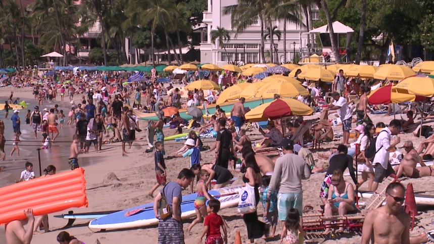 crowded-waikiki-beach-tourists-tourism.jpg