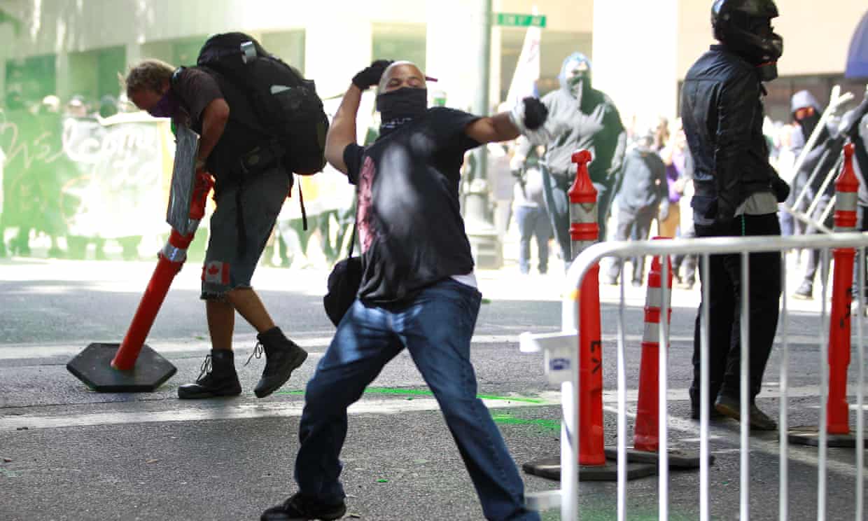 Tiny throwing object Portland proud boys